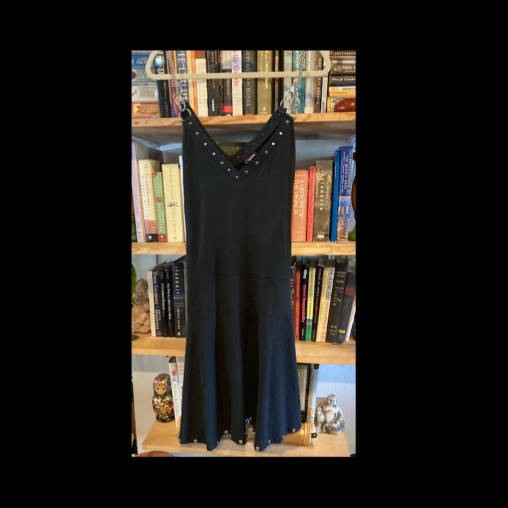 Black sleeveless dress.